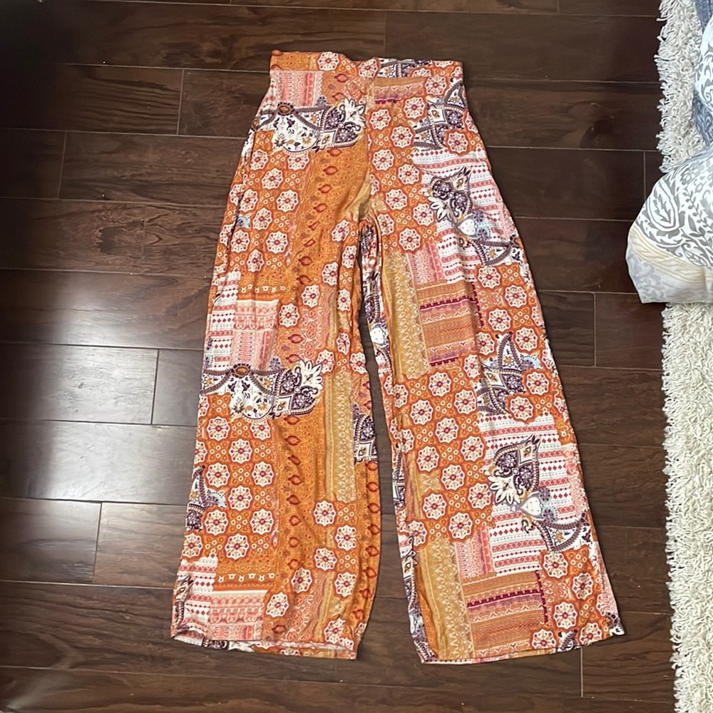 Orange patterned boho flowy pants with elastic waistband